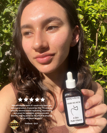 Young women holding Bare and Rose natural face oil. 5 star review written on the bottom left.