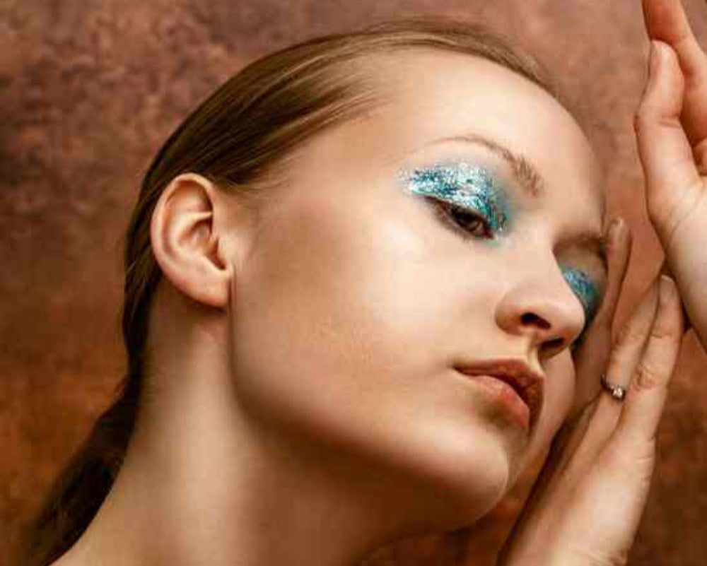 Beautiful women with non-toxic makeup posing.