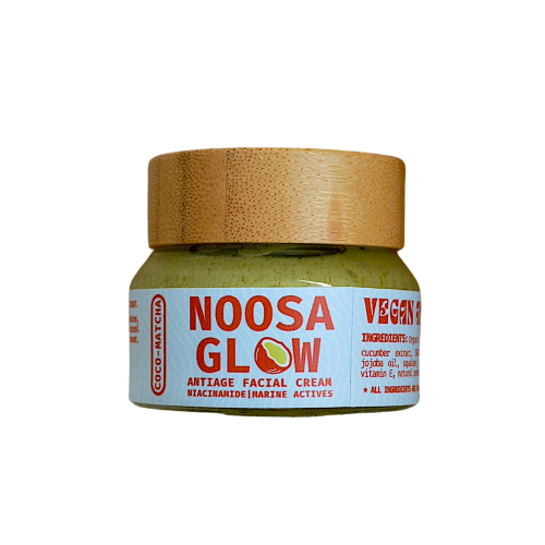Noosa Glow facial cream jar with wooden lid on a white background